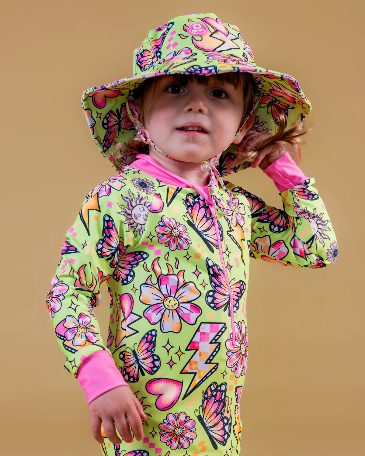 Butterfly Babe butterfly print baby sunsuit, photo 3 – bright UPF50+ long sleeve swimsuit by Cucumber Cool