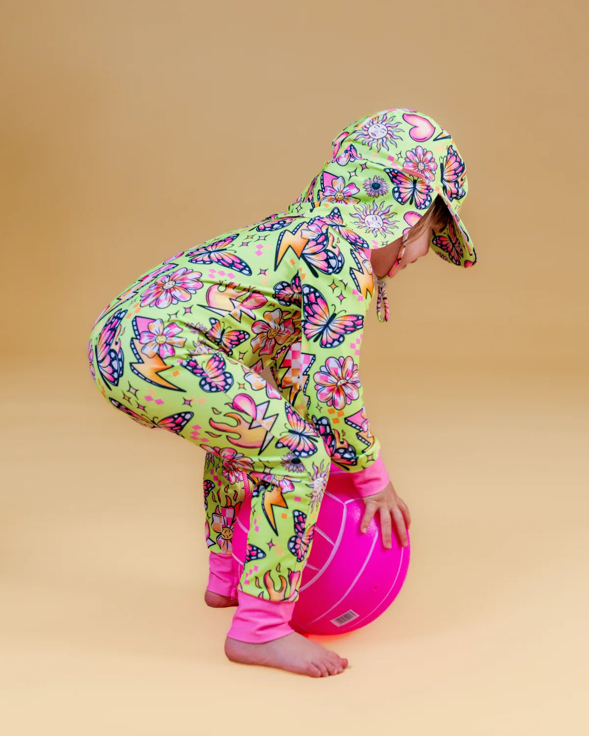 Butterfly Babe butterfly print toddler sunsuit – bright UPF50+ long sleeve swimsuit by Cucumber Cool
