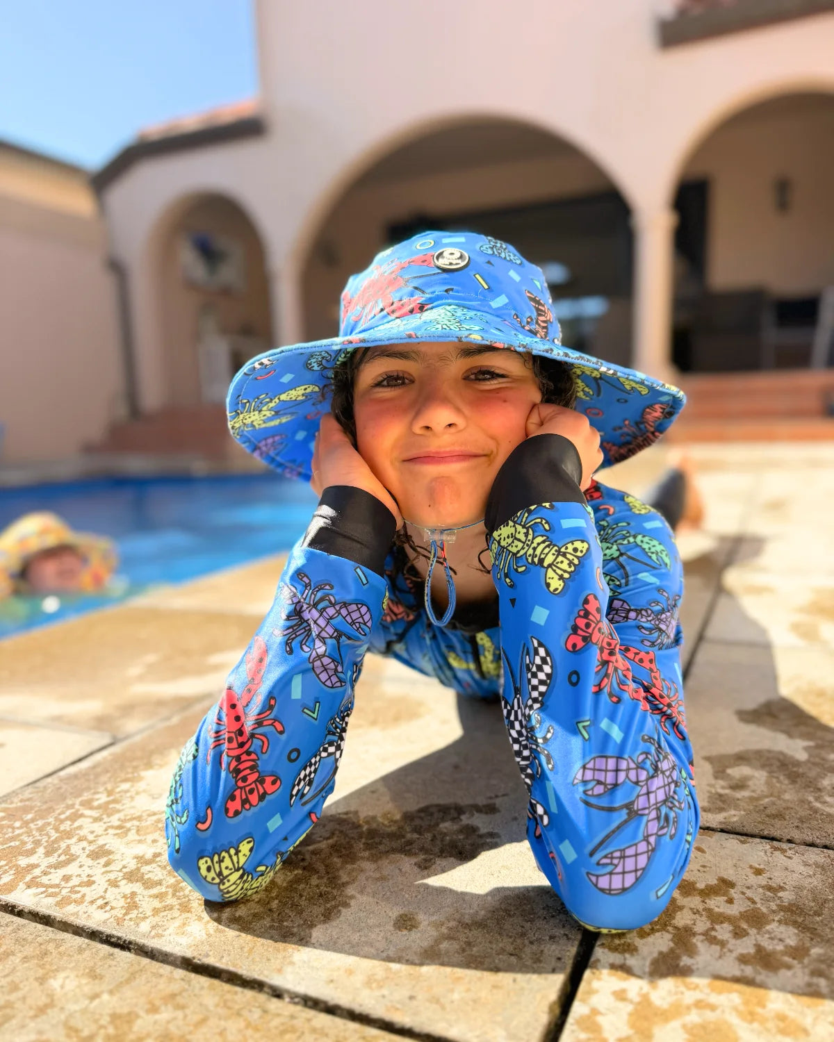 Crazy Claws kids swim bucket hat with chin strap – bright UPF50+ round brim beach hat by Cucumber Cool