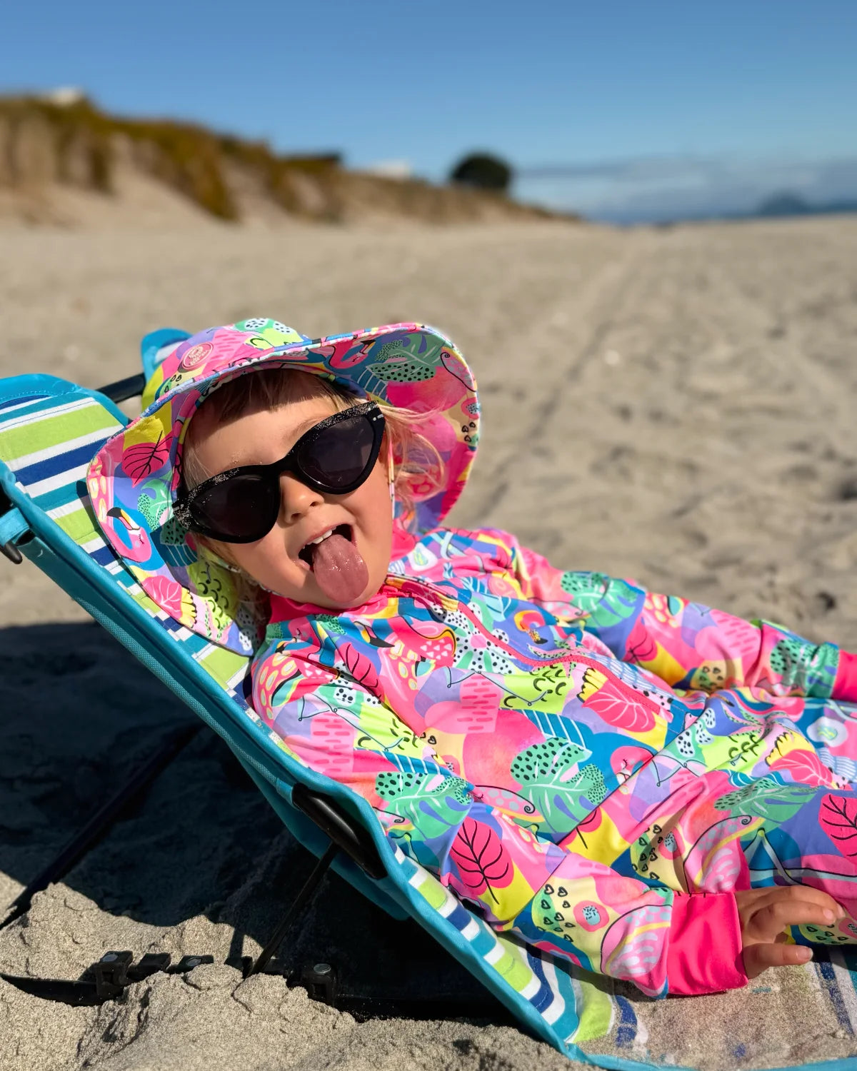 Club Tropicana tropical print baby sunsuit, photo 3 – bright UPF50+ long sleeve swimsuit by Cucumber Cool