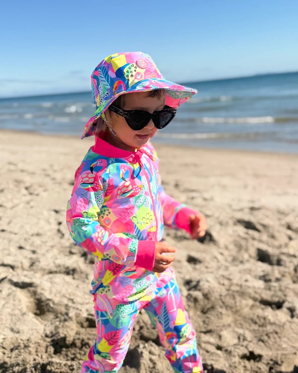 Club Tropicana tropical print toddler sunsuit, photo 4 – bright UPF50+ long sleeve swimsuit by Cucumber Cool