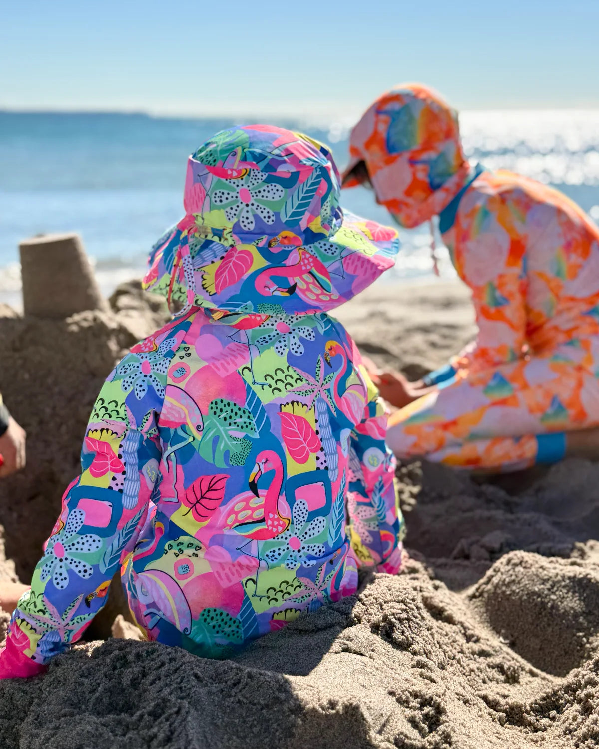 Club Tropicana tropical print baby sunsuit, photo 5 – bright UPF50+ long sleeve swimsuit by Cucumber Cool