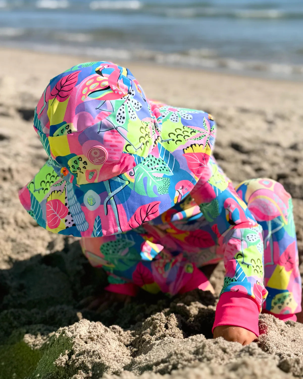 Club Tropicana tropical print kids swim bucket hat with chin strap, photo 6 – bright UPF50+ round brim beach hat by Cucumber Cool