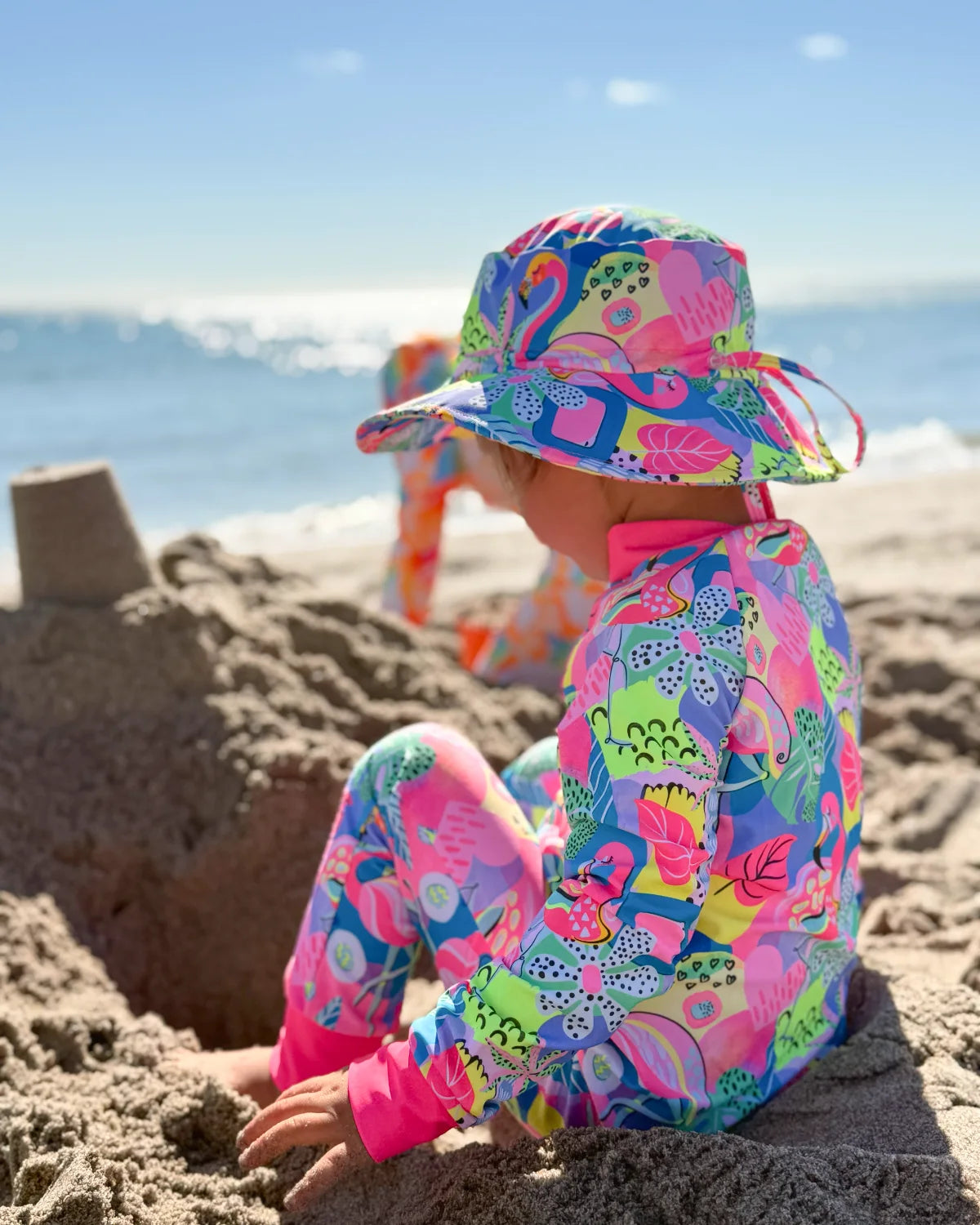 Club Tropicana tropical print kids swim bucket hat with chin strap, photo 5 – bright UPF50+ round brim beach hat by Cucumber Cool