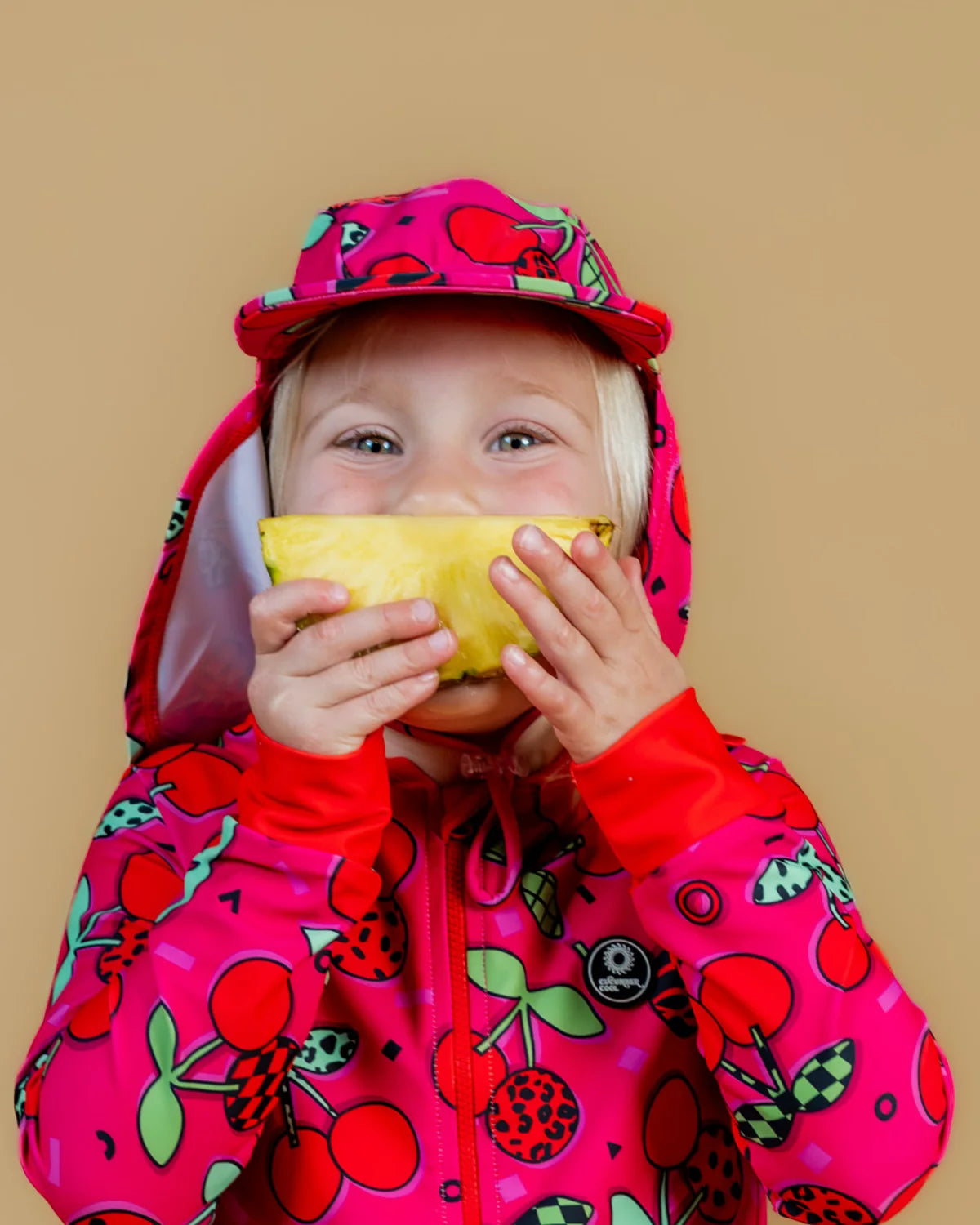 Cherry Pop legionnaire swim hat with neck flap – bright UPF50+ kids & baby sun hat by Cucumber Cool