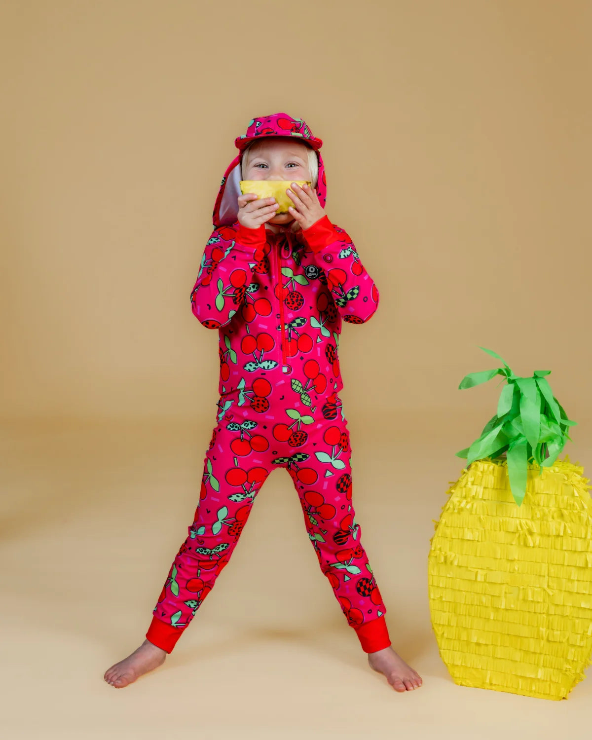 Cherry Pop kids sunsuit, photo 3 – bright UPF50+ long sleeve full coverage swimsuit by Cucumber Cool