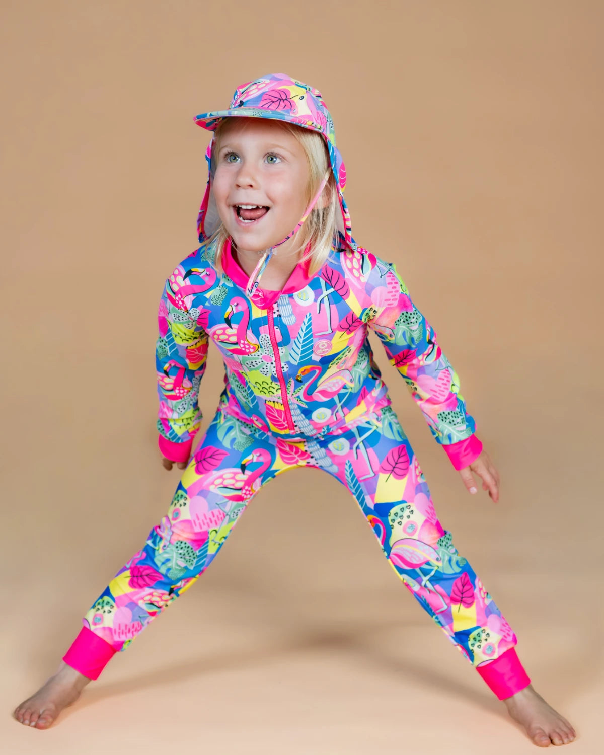 Club Tropicana tropical print kids sunsuit – bright UPF50+ long sleeve full coverage swimsuit by Cucumber Cool