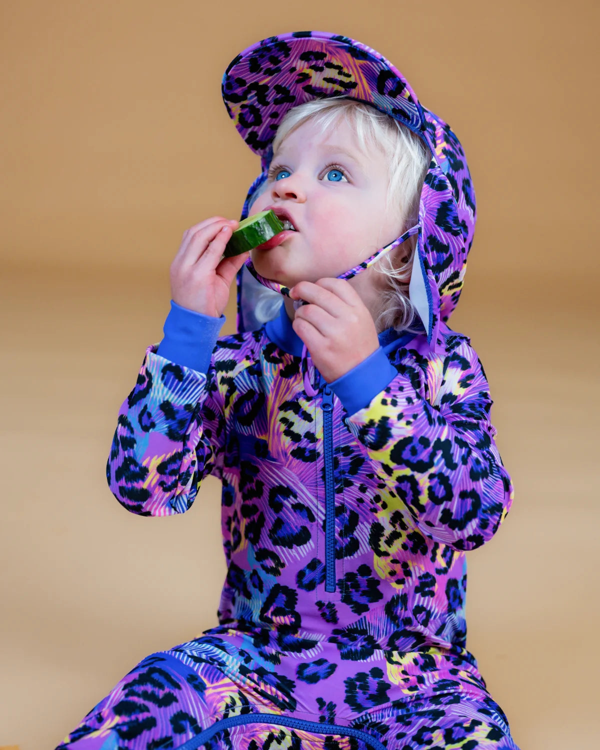 Electric Meow leopard print toddler sunsuit, photo 3 – bright UPF50+ long sleeve swimsuit by Cucumber Cool