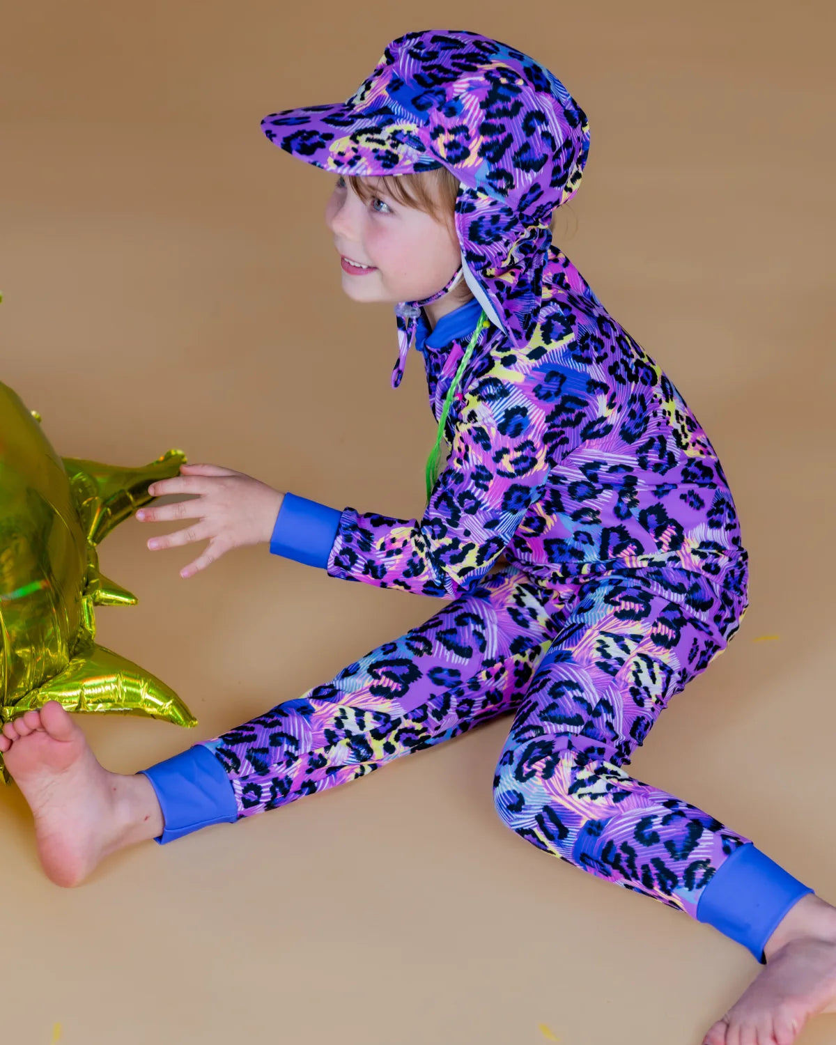 Electric Meow leopard print kids sunsuit, photo 6 – bright UPF50+ long sleeve full coverage swimsuit by Cucumber Cool