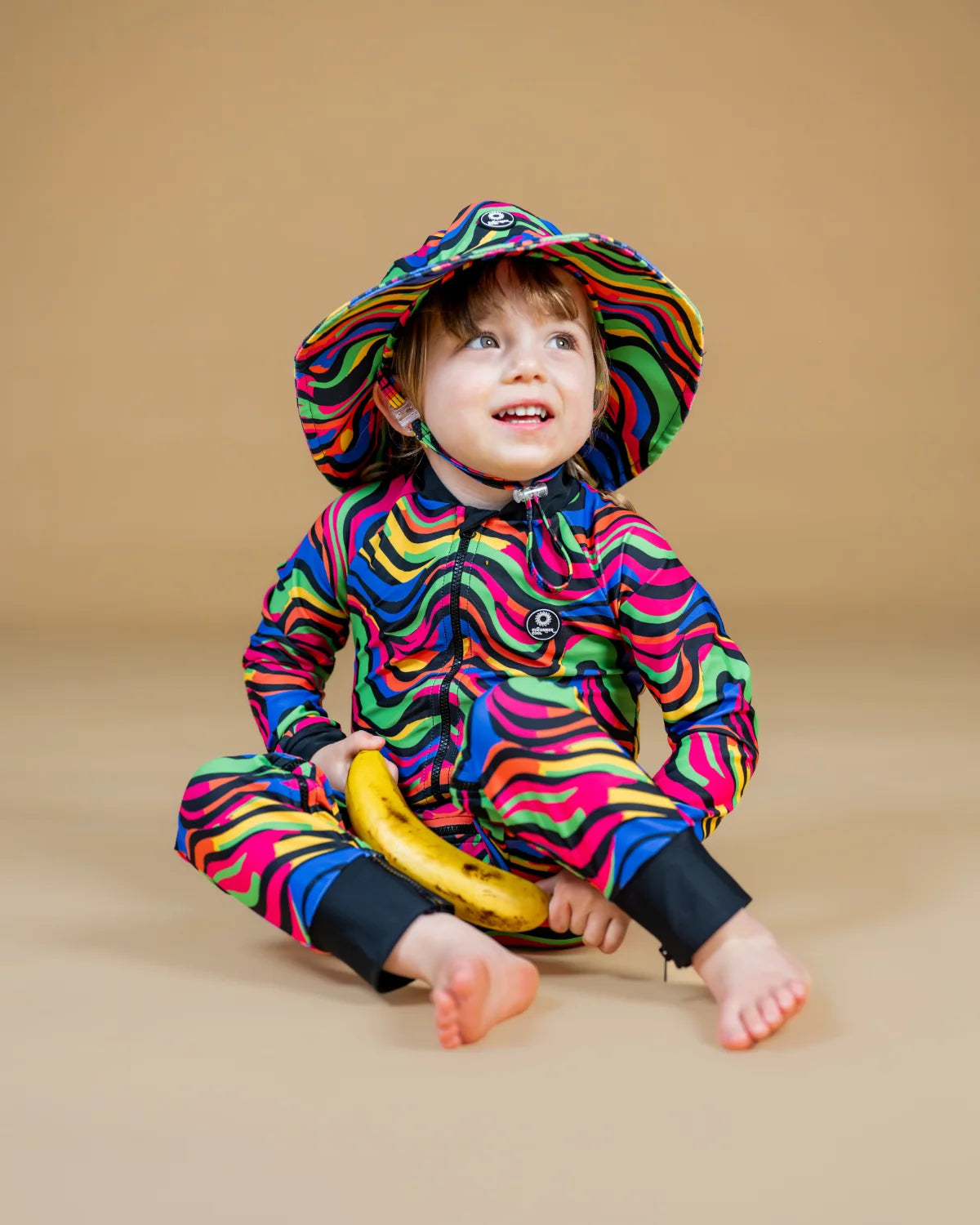 Look At Me Leopard leopard print toddler sunsuit – bright UPF50+ long sleeve swimsuit by Cucumber Cool