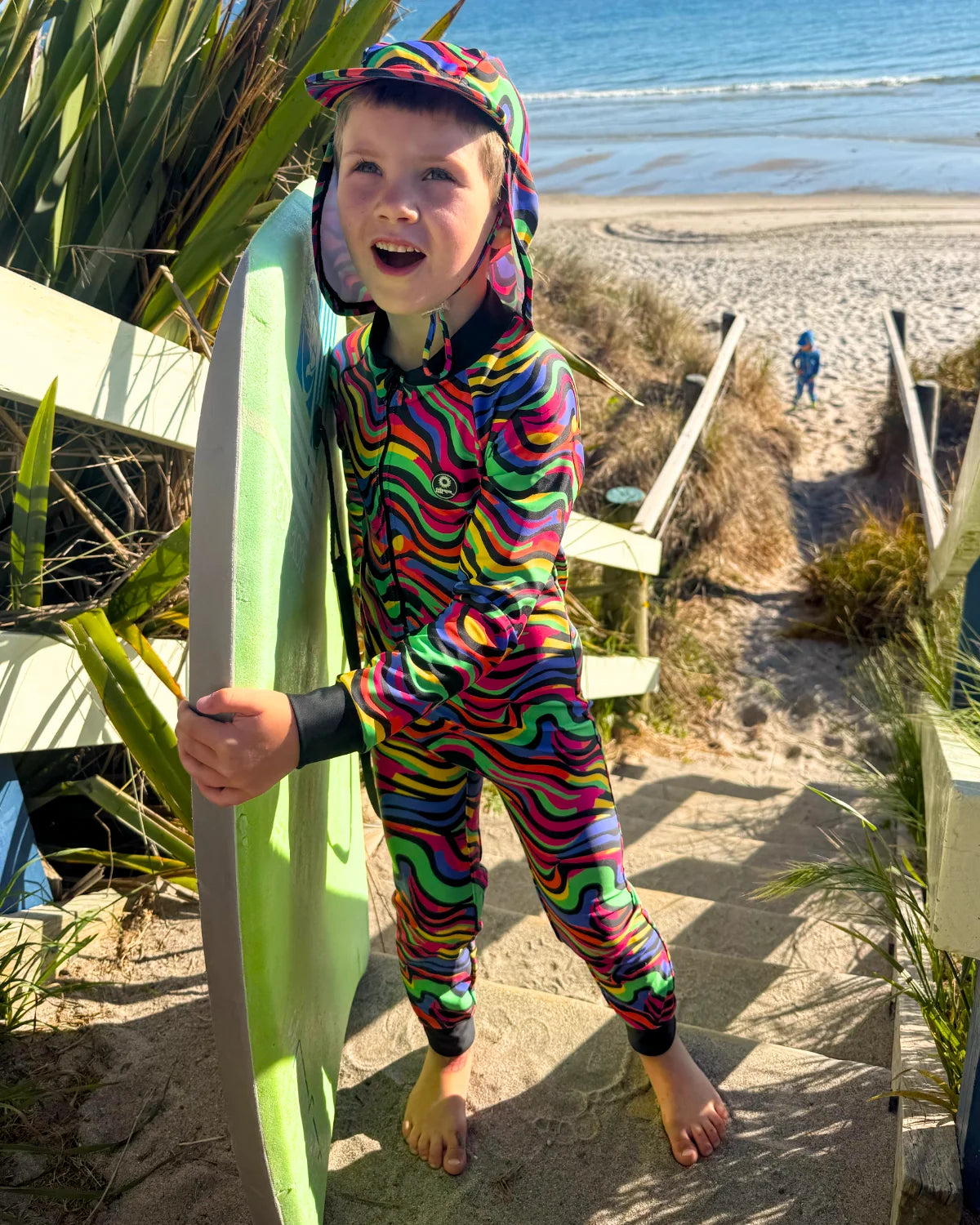 Look At Me Leopard leopard print kids sunsuit, photo 2 – bright UPF50+ long sleeve full coverage swimsuit by Cucumber Cool