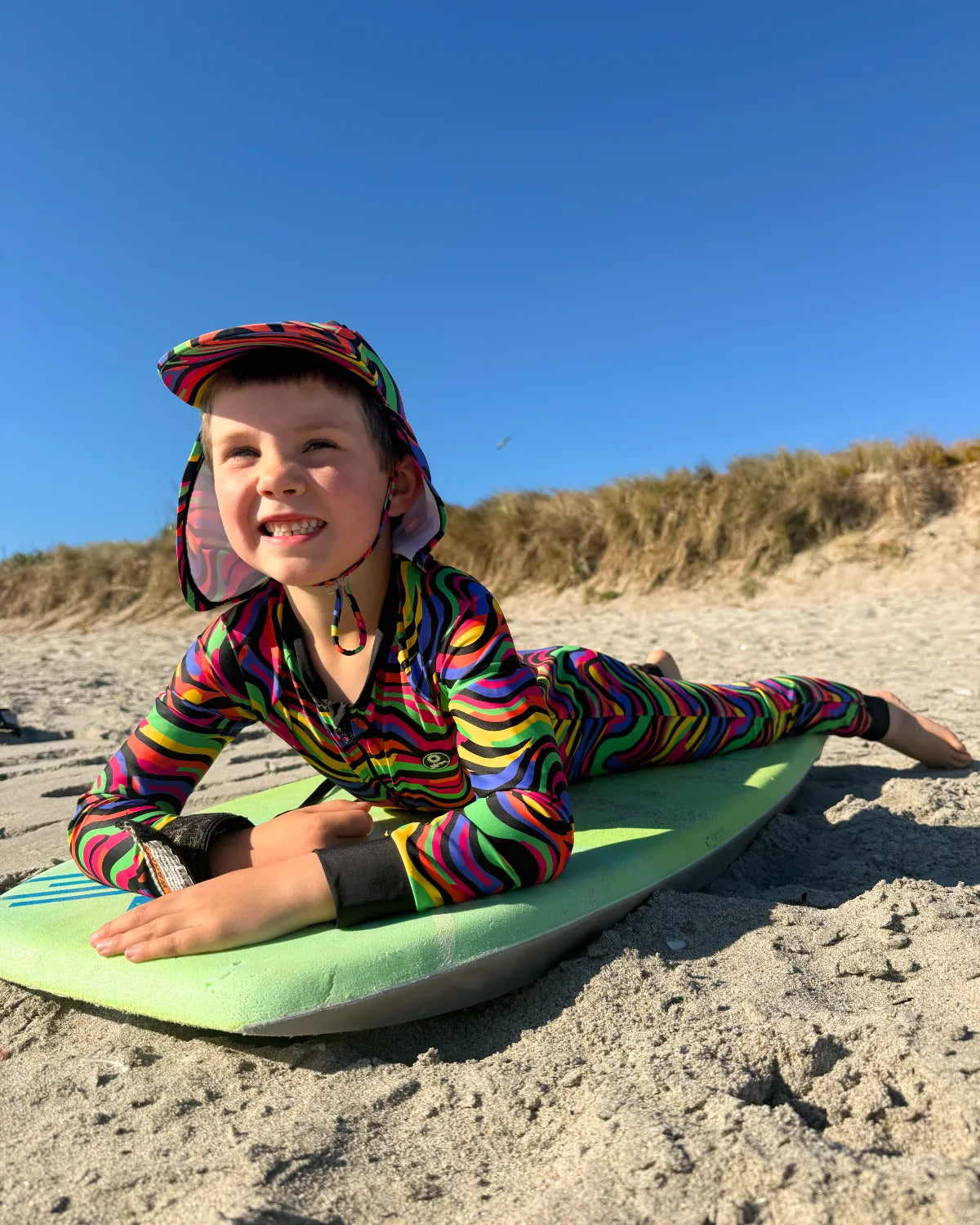 Look At Me Leopard leopard print kids sunsuit, photo 3 – bright UPF50+ long sleeve full coverage swimsuit by Cucumber Cool