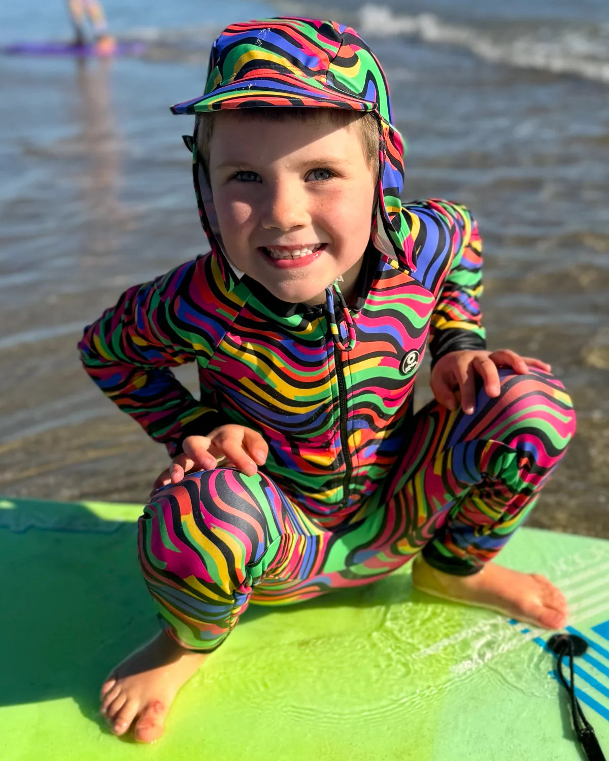 Look At Me Leopard leopard print kids sunsuit, photo 4 – bright UPF50+ long sleeve full coverage swimsuit by Cucumber Cool