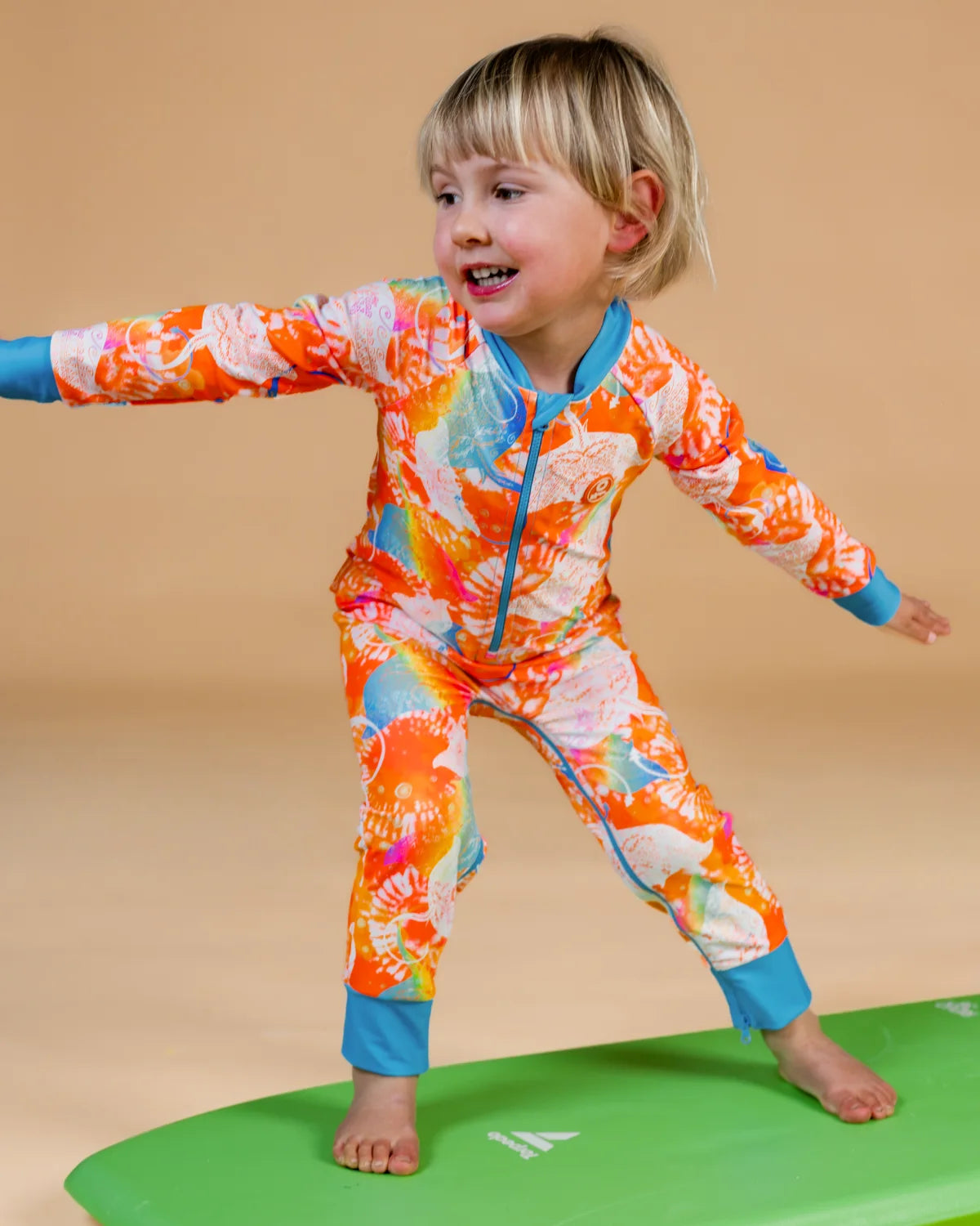 Manta Magic toddler sunsuit – bright UPF50+ long sleeve swimsuit by Cucumber Cool