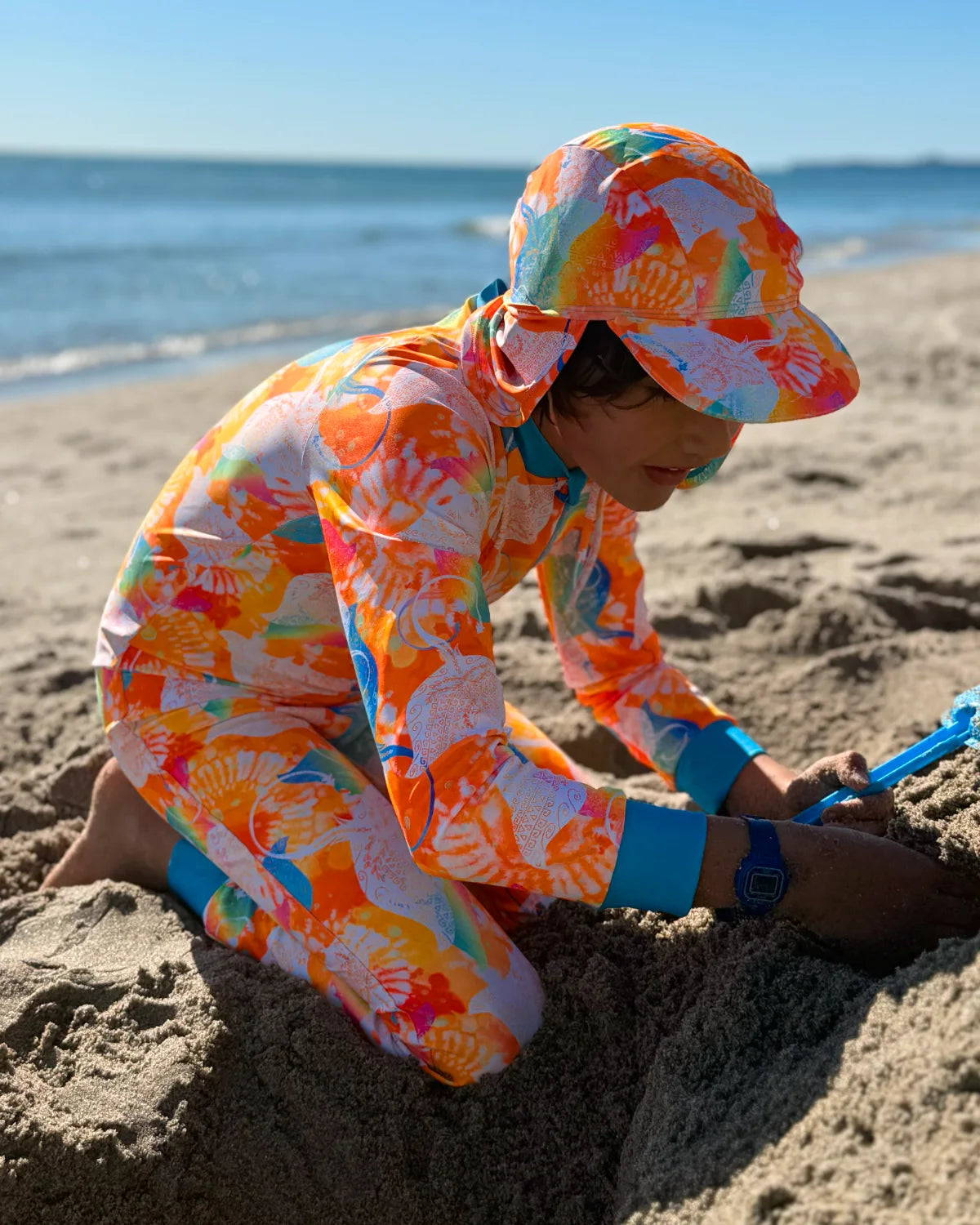 Manta Magic kids sunsuit, photo 2 – bright UPF50+ long sleeve full coverage swimsuit by Cucumber Cool