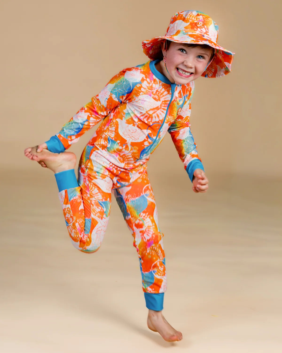 Manta Magic kids sunsuit, photo 10 – bright UPF50+ long sleeve full coverage swimsuit by Cucumber Cool