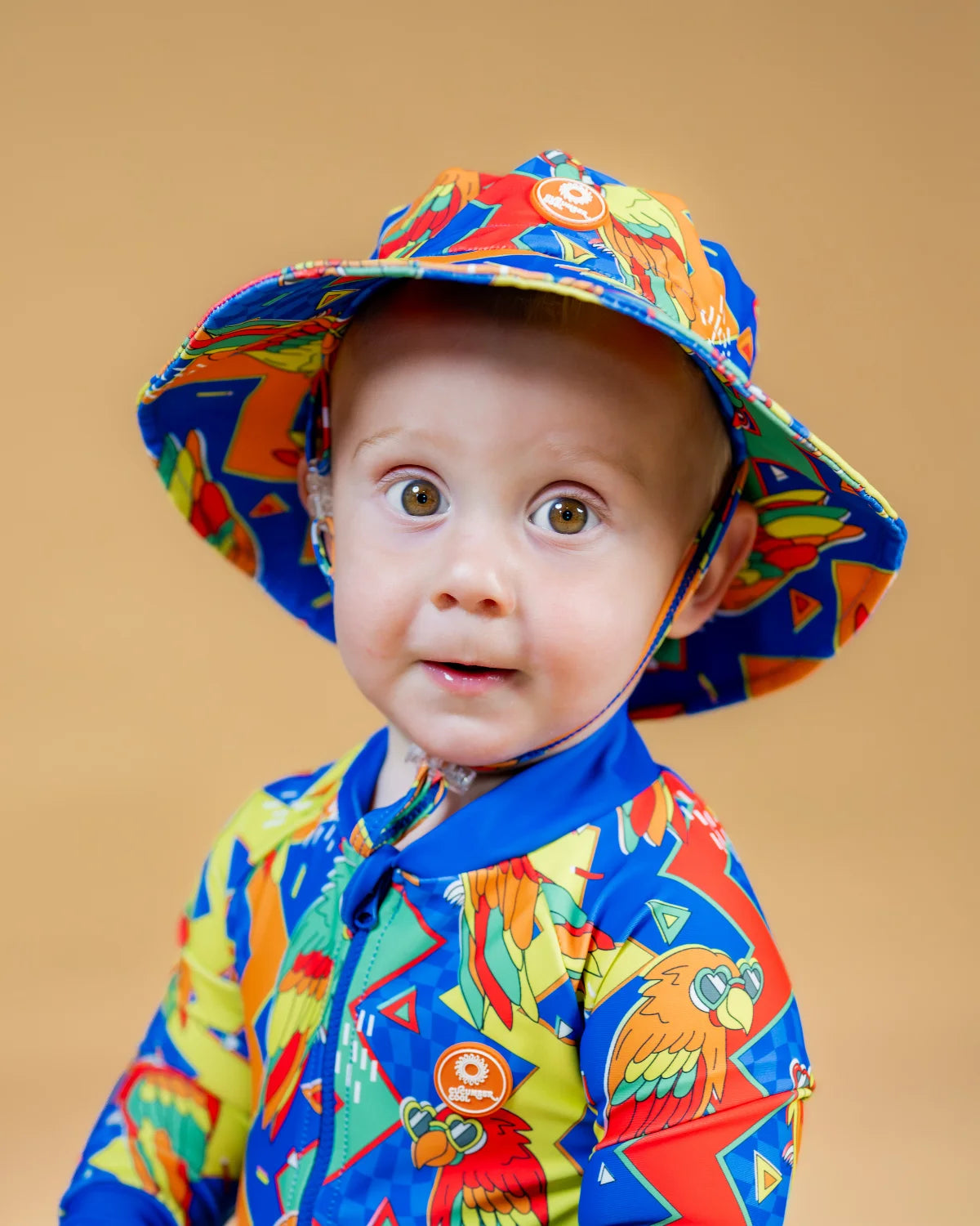 Polly Pizazz kids swim bucket hat with chin strap – bright UPF50+ round brim beach hat by Cucumber Cool