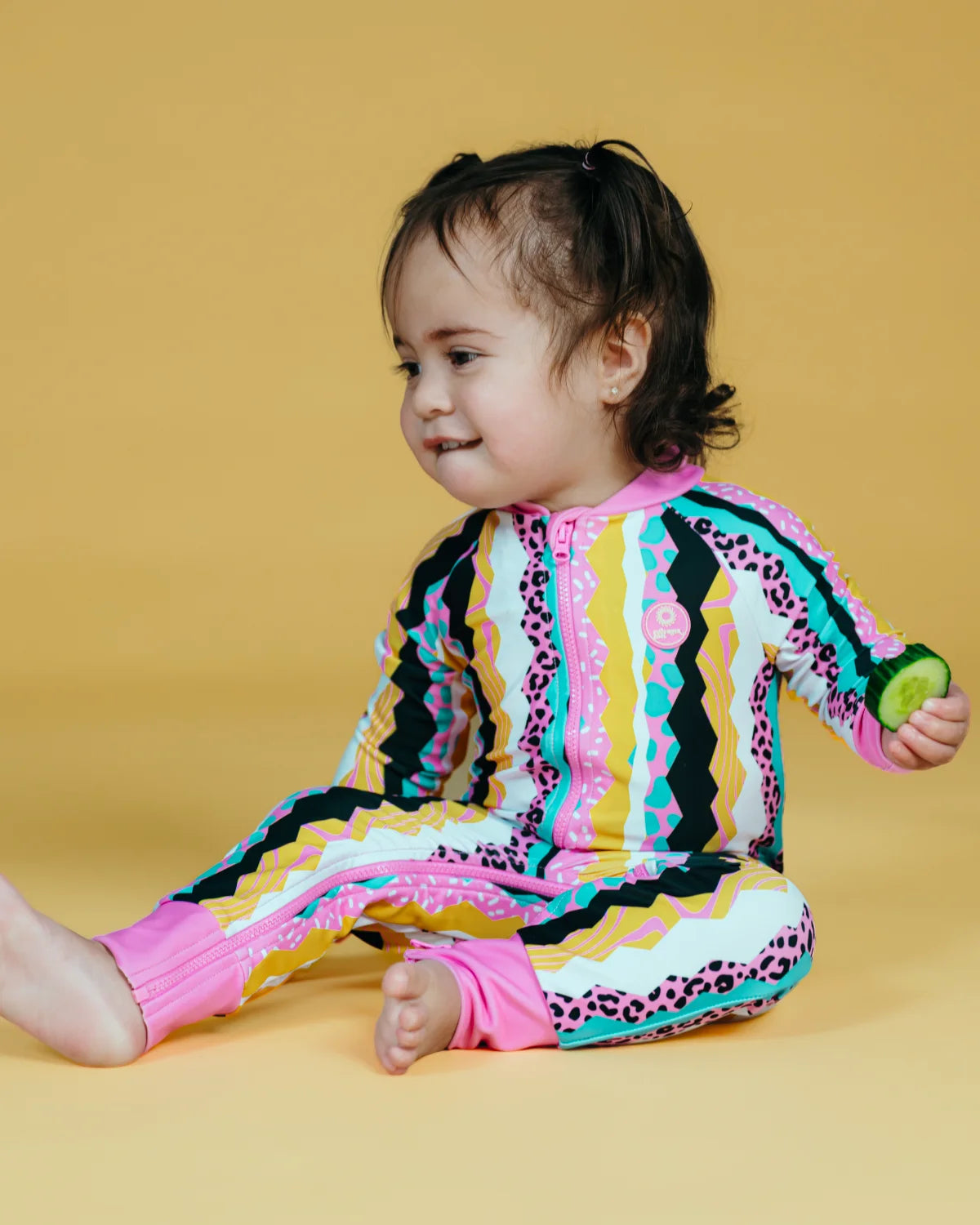 Snazzy Stripes striped toddler sunsuit – bright UPF50+ long sleeve swimsuit by Cucumber Cool
