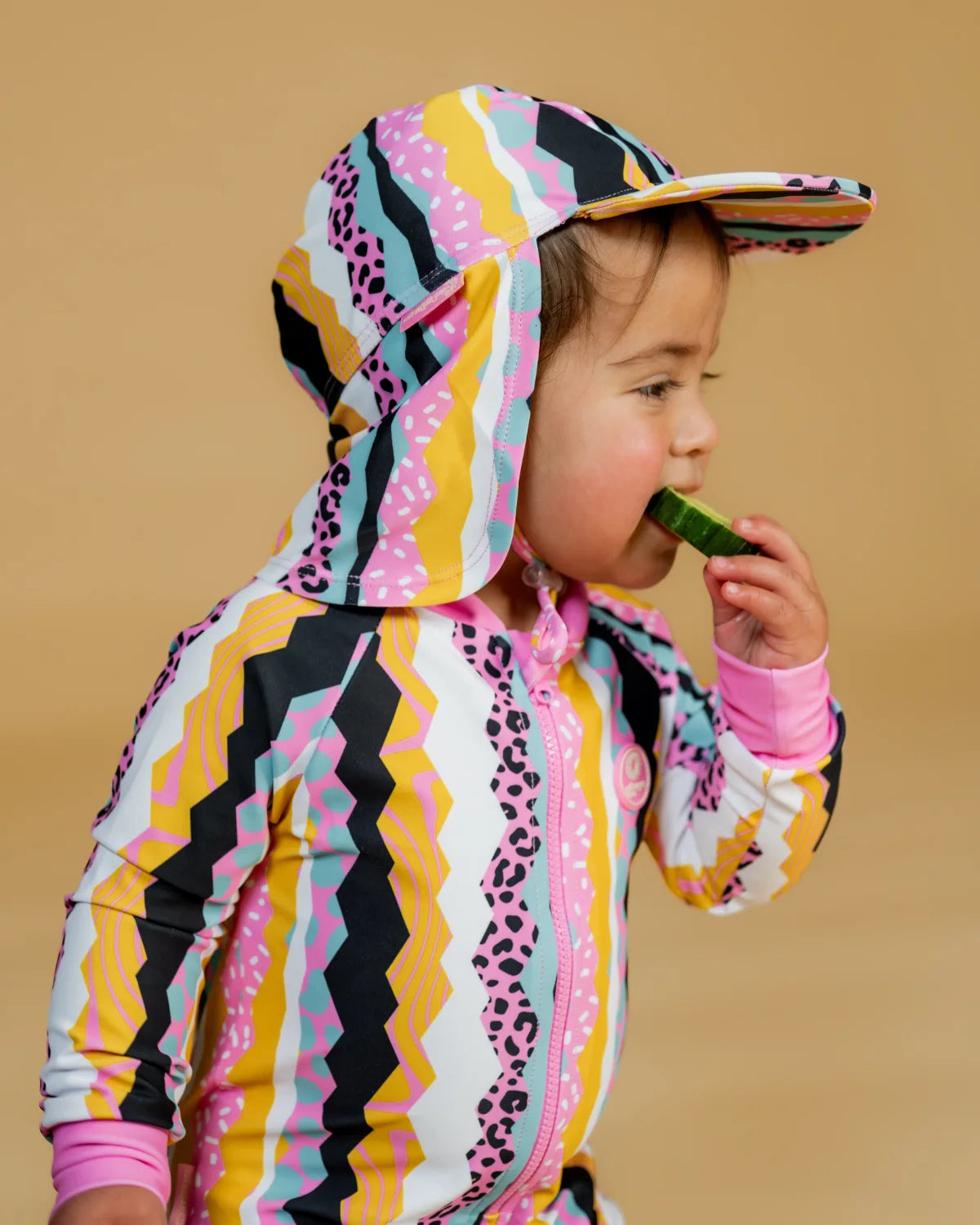 Snazzy Stripes striped toddler sunsuit, photo 3 – bright UPF50+ long sleeve swimsuit by Cucumber Cool