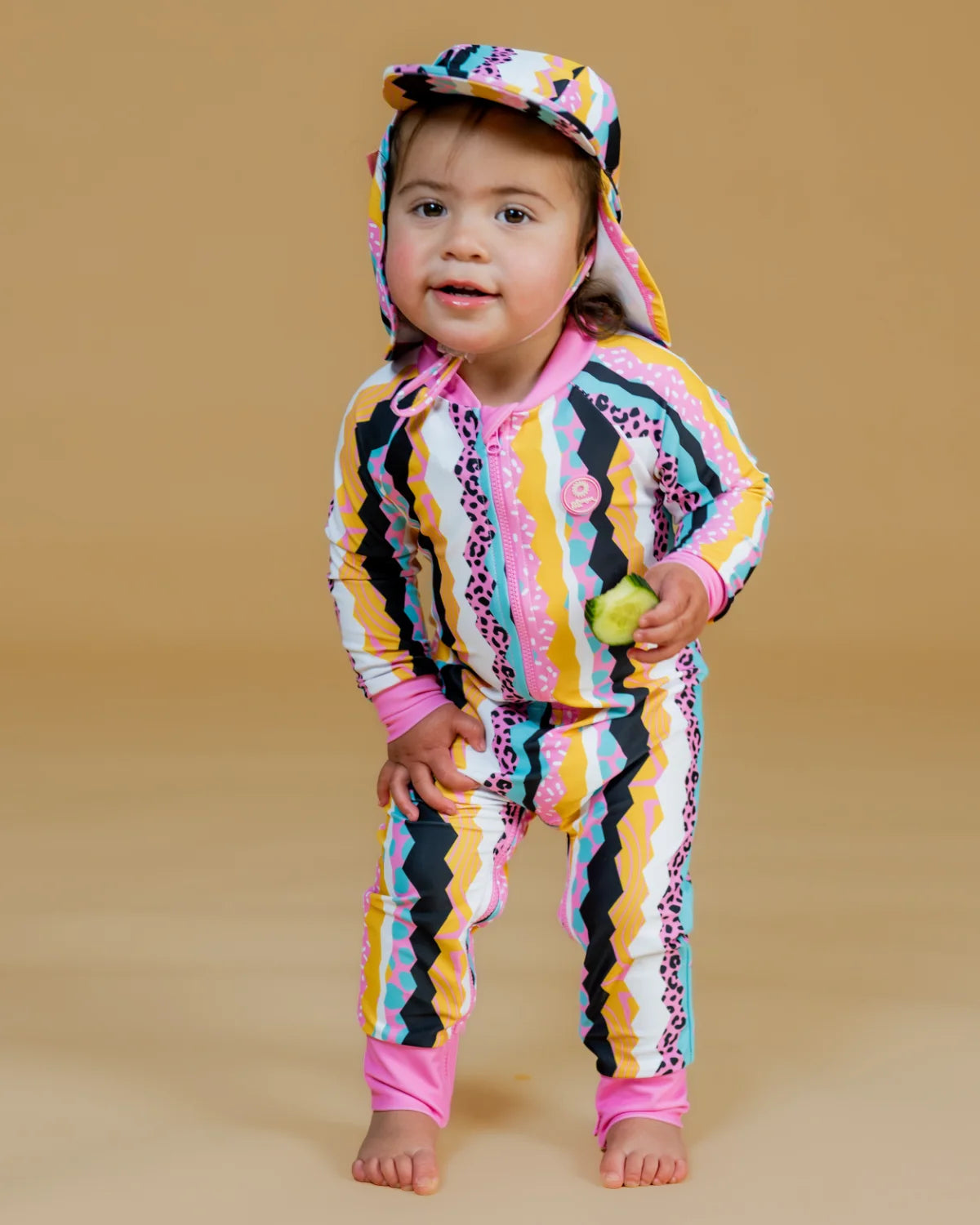 Snazzy Stripes striped baby sunsuit, photo 2 – bright UPF50+ long sleeve swimsuit by Cucumber Cool