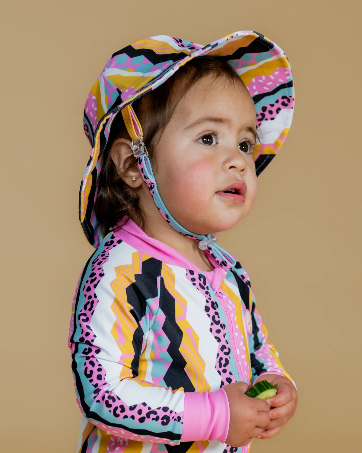 Snazzy Stripes striped kids swim bucket hat with chin strap – bright UPF50+ round brim beach hat by Cucumber Cool