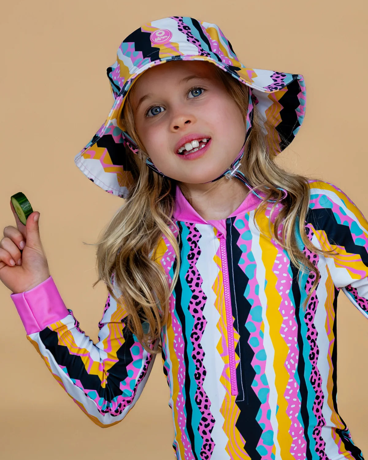 Snazzy Stripes striped kids sunsuit, photo 2 – bright UPF50+ long sleeve full coverage swimsuit by Cucumber Cool