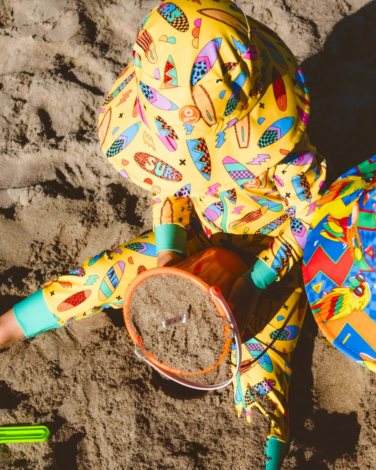 Surf's Up! toddler sunsuit – bright UPF50+ long sleeve swimsuit by Cucumber Cool