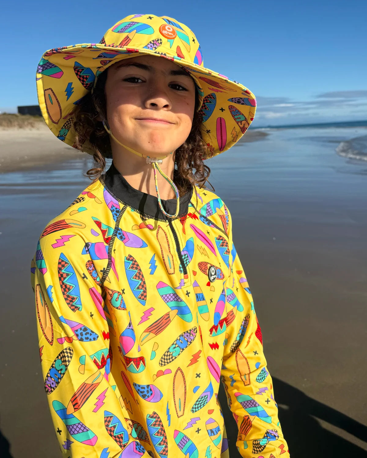 Surf's Up! kids swim bucket hat with chin strap – bright UPF50+ round brim beach hat by Cucumber Cool