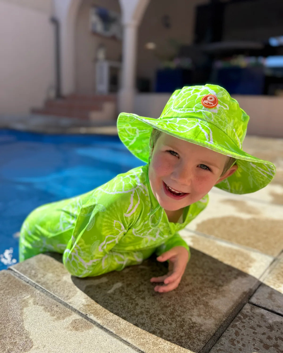 Turtle-Tastic kids swim bucket hat with chin strap, photo 2 – bright UPF50+ round brim beach hat by Cucumber Cool