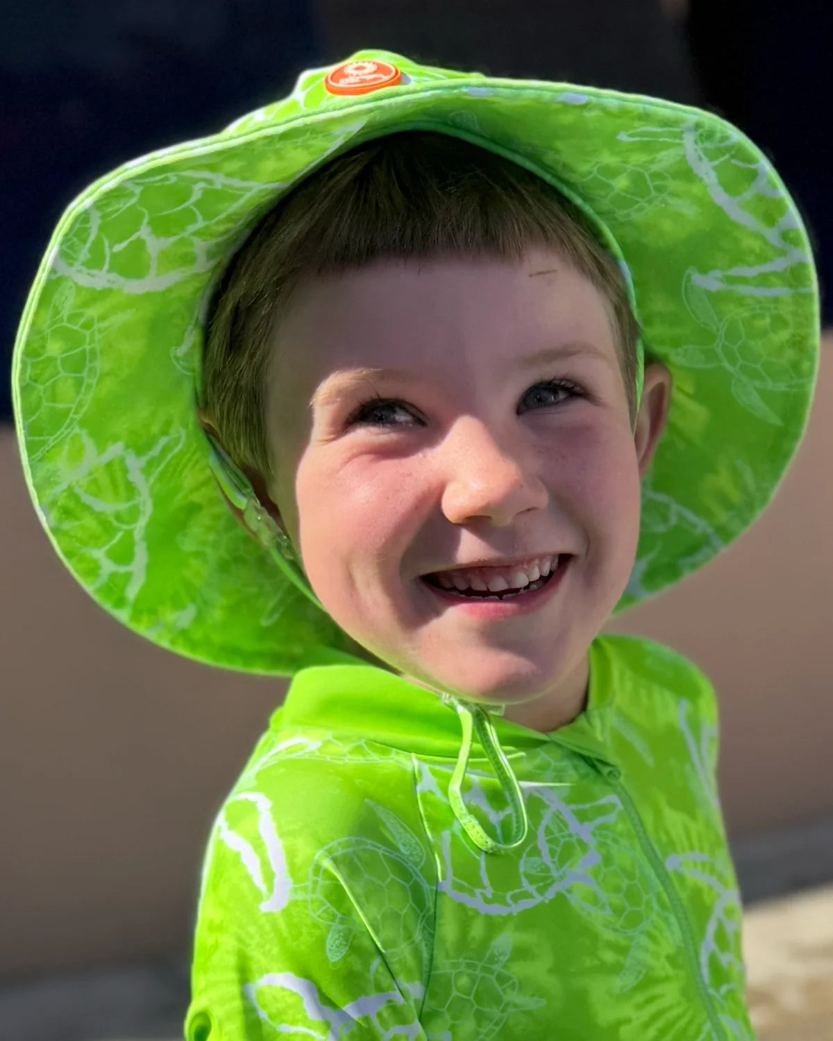 Turtle-Tastic kids swim bucket hat with chin strap, photo 5 – bright UPF50+ round brim beach hat by Cucumber Cool