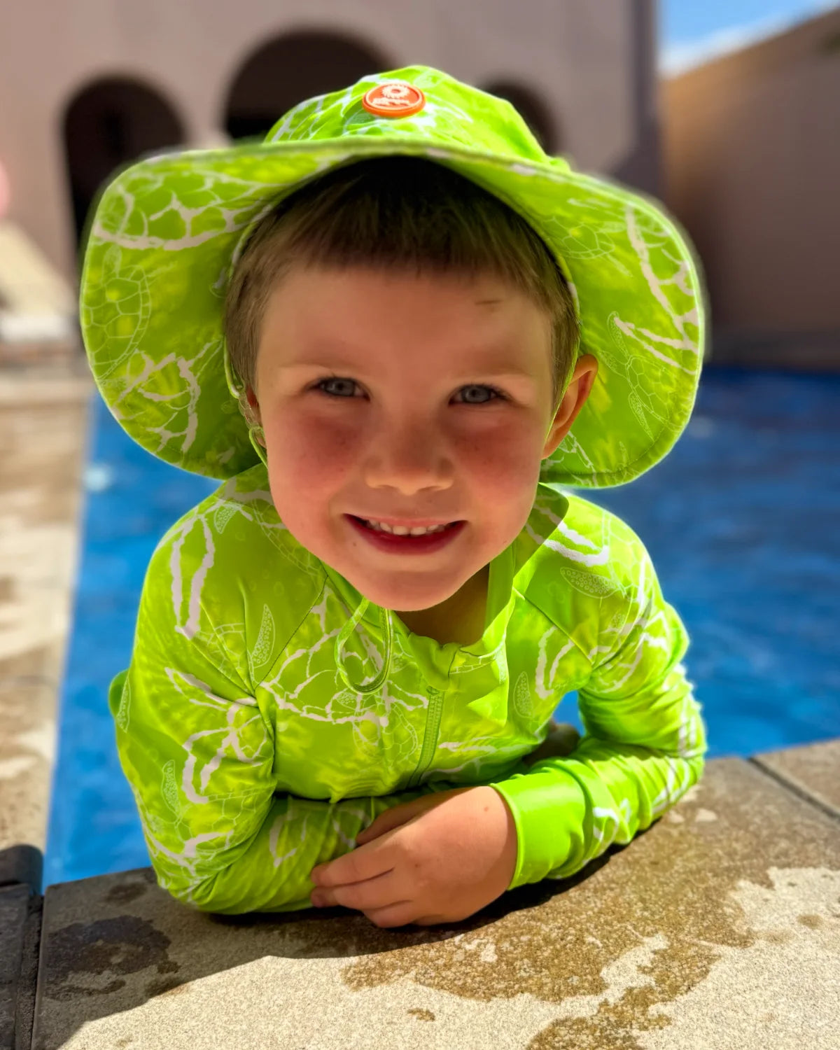Turtle-Tastic kids swim bucket hat with chin strap – bright UPF50+ round brim beach hat by Cucumber Cool