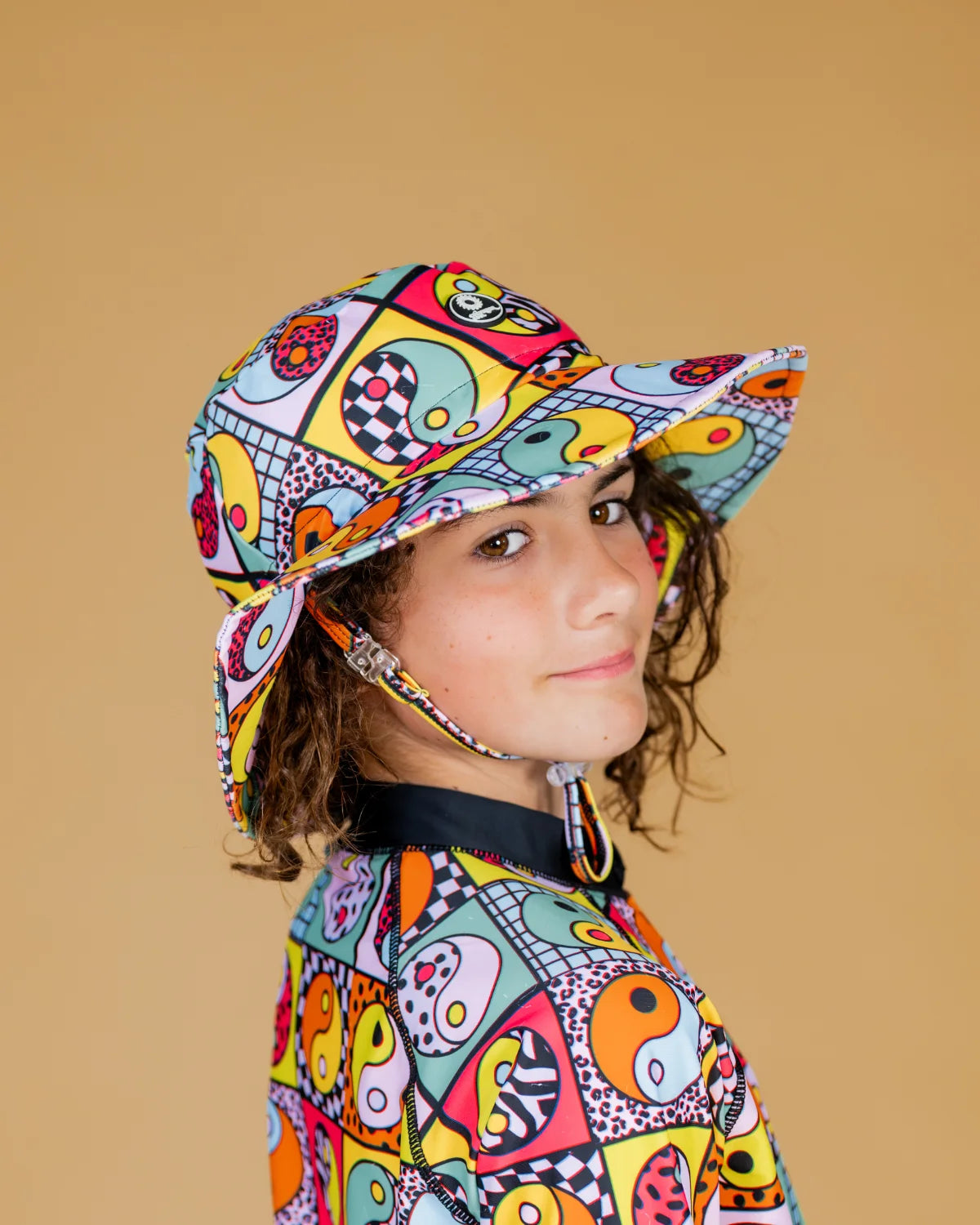 Yin Yang Yeah! kids swim bucket hat with chin strap, photo 6 – bright UPF50+ round brim beach hat by Cucumber Cool