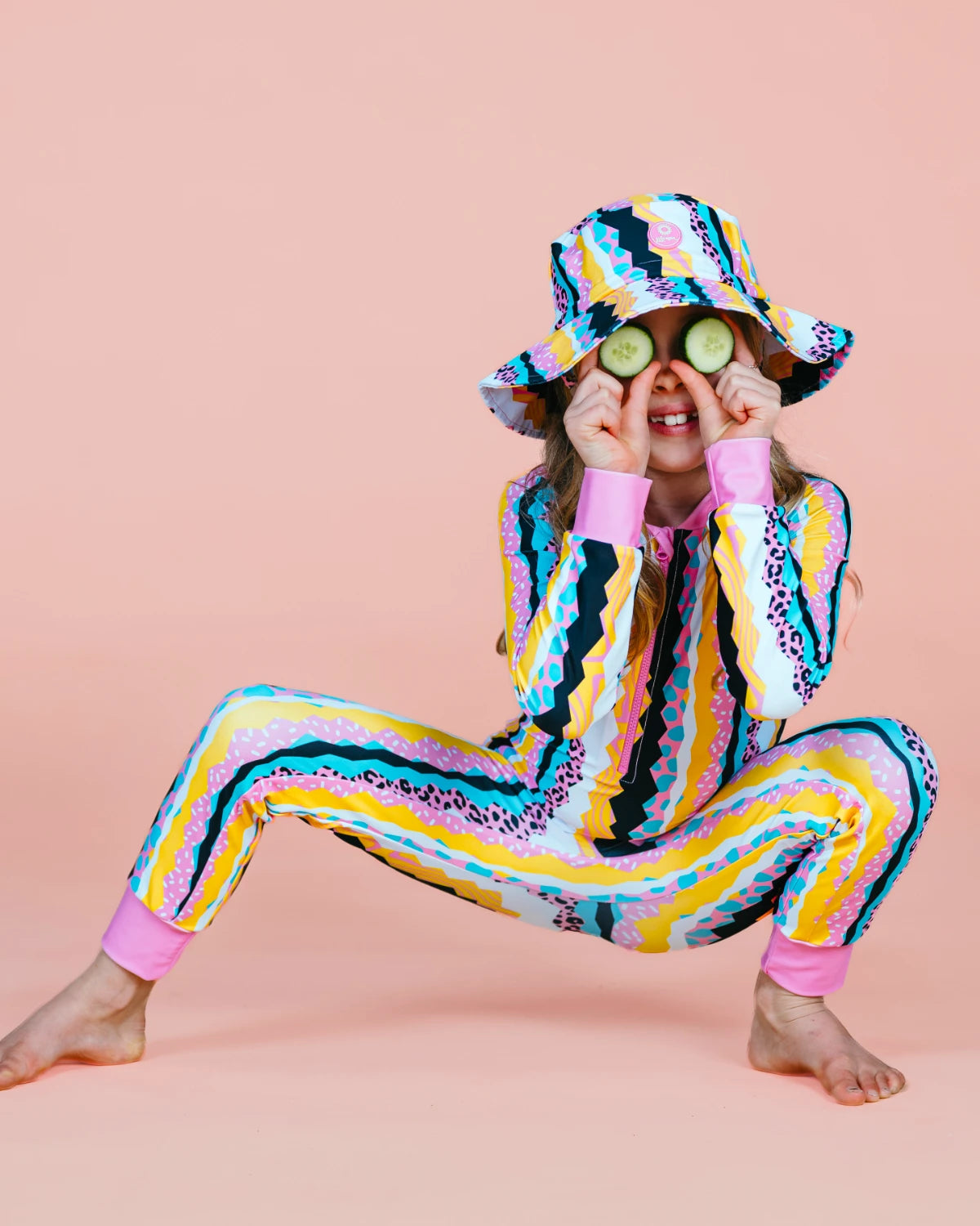 Snazzy Stripes striped kids sunsuit, photo 3 – bright UPF50+ long sleeve full coverage swimsuit by Cucumber Cool